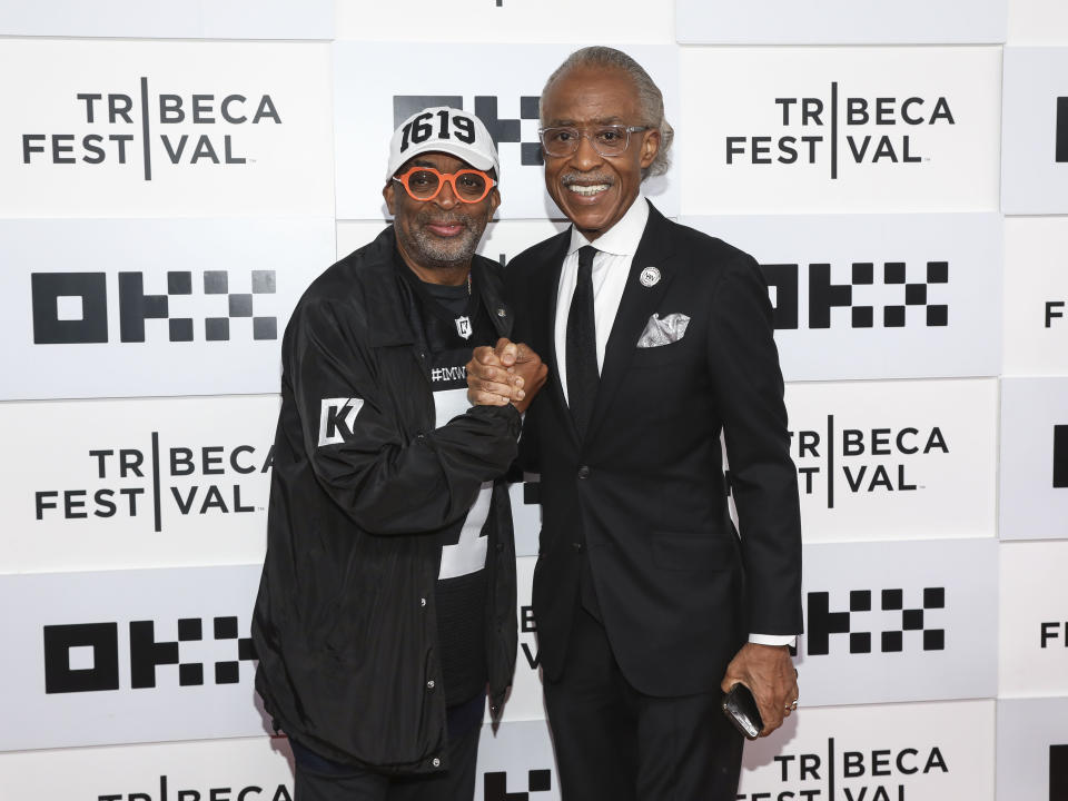 Director Spike Lee, left, and journalist Al Sharpton, right, attend the premiere for "Loudmouth" at the BMCC Tribeca Performing Arts Center during the 2022 Tribeca Festival on Saturday, June 18, 2022, in New York. (Photo by Andy Kropa/Invision/AP)