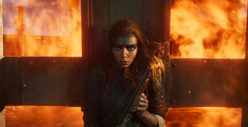 Anya Taylor-Joy's title character finds shelter from the flames in the action-packed prequel "Furiosa: A Mad Max Saga."