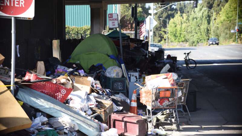 Homeless encampment under an overpass in Oakland, California.