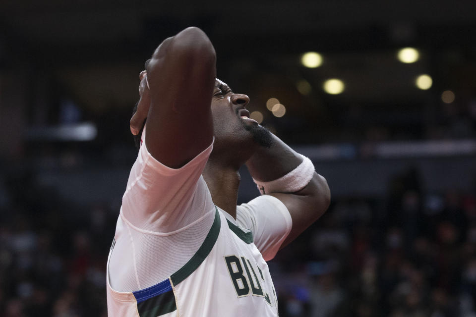 Milwaukee Bucks' Bobby Portis reacts in the final seconds of the team's loss to the Toronto Raptors in an NBA basketball game Thursday, Dec. 2, 2021, in Toronto. (Chris Young/The Canadian Press via AP)
