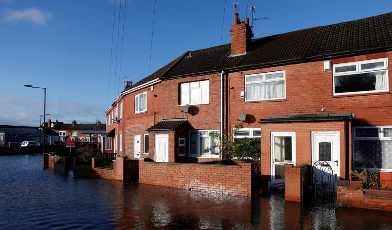 A general view shows a flooded street in Bentley, north of Doncaster