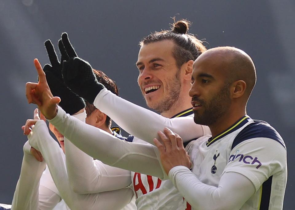 Gareth Bale and Lucas Moura celebrate together (Reuters)