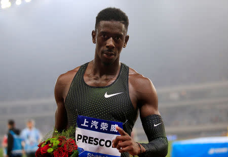 Athletics - Diamond League - Shanghai - Shanghai Stadium, Shanghai, China - May 12, 2018 Great Britain's Reece Prescod celebrates winning the men's 100m REUTERS/Aly Song