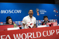 Kosovo singer Era Istrefi, U.S. actor Will Smith and singer Nicky Jam, from left, arrive to a news conference during the 2018 soccer World Cup at the Luzhniki stadium in Moscow, Russia, Friday, July 13, 2018. (AP Photo/Francisco Seco)