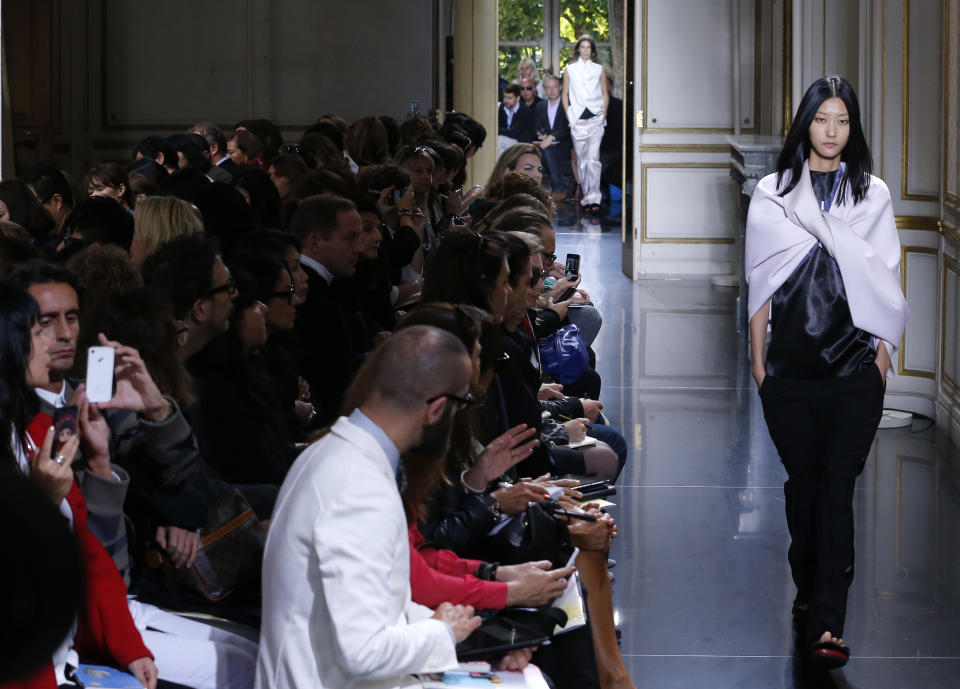 A model wears a creation by British fashion designer Phoebe Philo for Celine's Spring-Summer 2013 ready to wear collection, presented in Paris, Sunday, Sept.30, 2012. (AP Photo/Jacques Brinon)