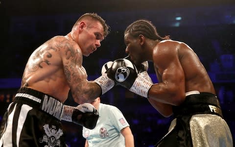 Martin Murray (left) and Hassam N'Dam compete in the Silver Middleweight Championship a - Credit: PA