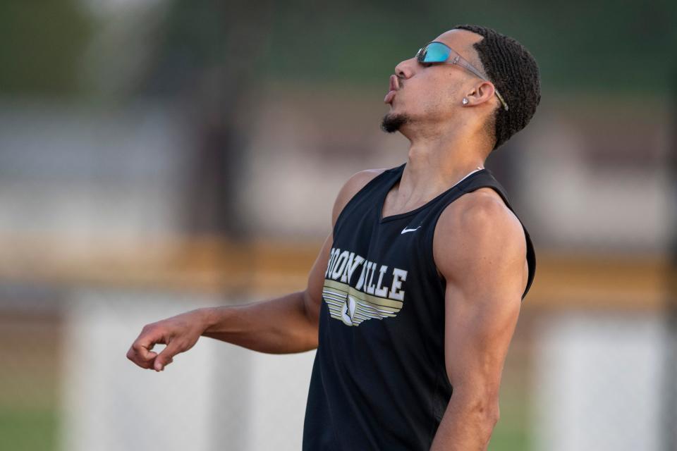 Boonville’s Marques Ballard reacts after the  200 meter dash during the 2023 IHSAA Boys Regional Track and Field meet at Central High School in Evansville, Ind., Thursday, May 25, 2023.