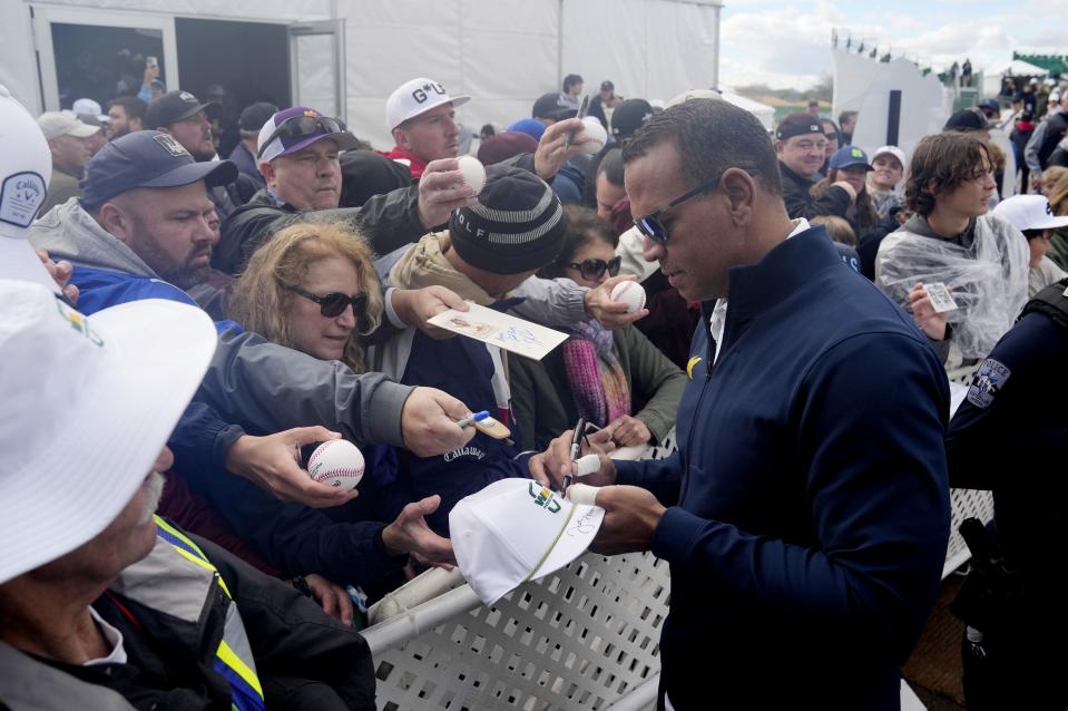 Baseball legend Alex Rodriguez signs autographs for fans at TPC Scottsdale on Feb. 7, 2024.