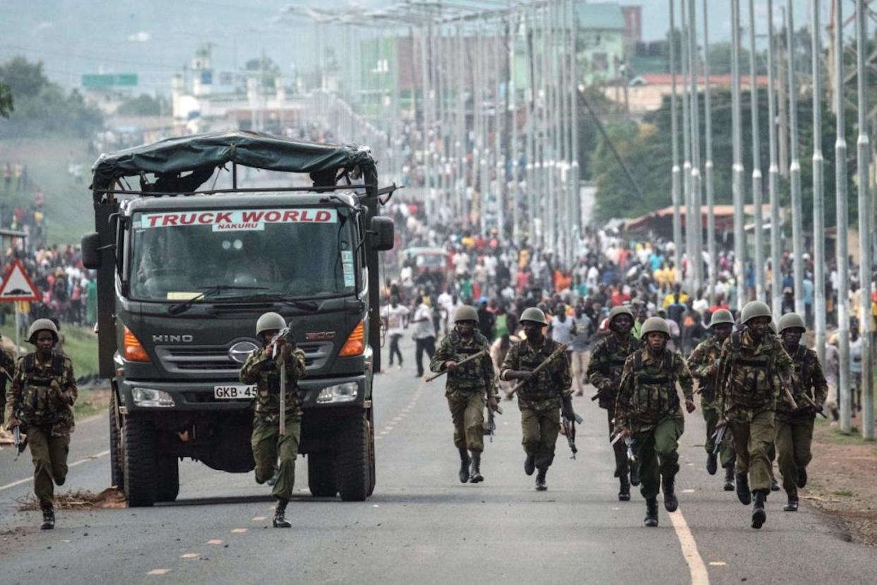 Protesters in Kisumu confront police officers after Kenya's disputed 2017 elections. Yasuyoshi Chiba/AFP via Getty Images