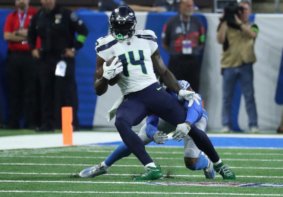 Seattle Seahawks wide receiver <a class="link " href="https://sports.yahoo.com/nfl/players/31896" data-i13n="sec:content-canvas;subsec:anchor_text;elm:context_link" data-ylk="slk:DK Metcalf;sec:content-canvas;subsec:anchor_text;elm:context_link;itc:0">DK Metcalf</a> (14) makes a catch against Detroit Lions cornerback <a class="link " href="https://sports.yahoo.com/nfl/players/33768" data-i13n="sec:content-canvas;subsec:anchor_text;elm:context_link" data-ylk="slk:Jerry Jacobs;sec:content-canvas;subsec:anchor_text;elm:context_link;itc:0">Jerry Jacobs</a> (23) during first half action Sunday, Sept.17 2023.