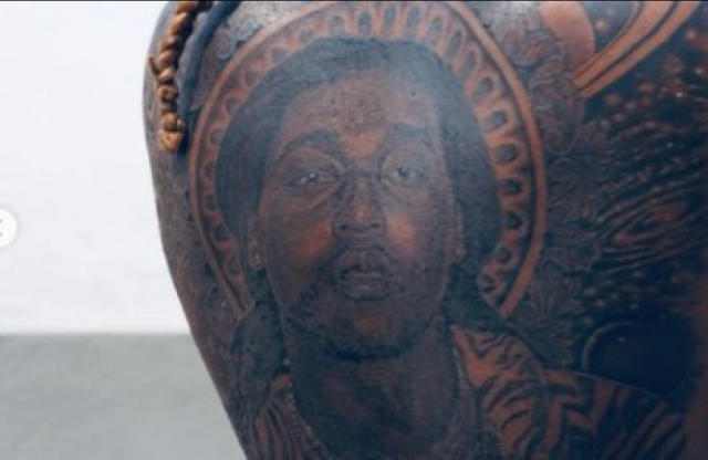 yg the rapper back tattoos