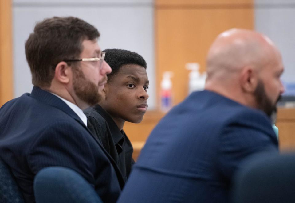 Tymetryon Knight, center, and his attorneys listen during his trial at the Escambia County Court House in Pensacola on Friday, Sept. 29, 2023.