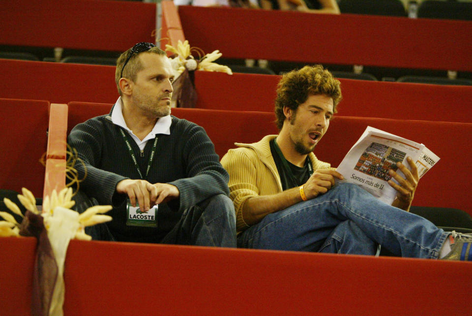 Singer Miguel Bose (L) and scullptor Nacho Palau are seen during Mutua Madrid Open tennis tournament at the Caja Magica on October 26, 2004 in Madrid (Photo by Europa Press via Getty Images)