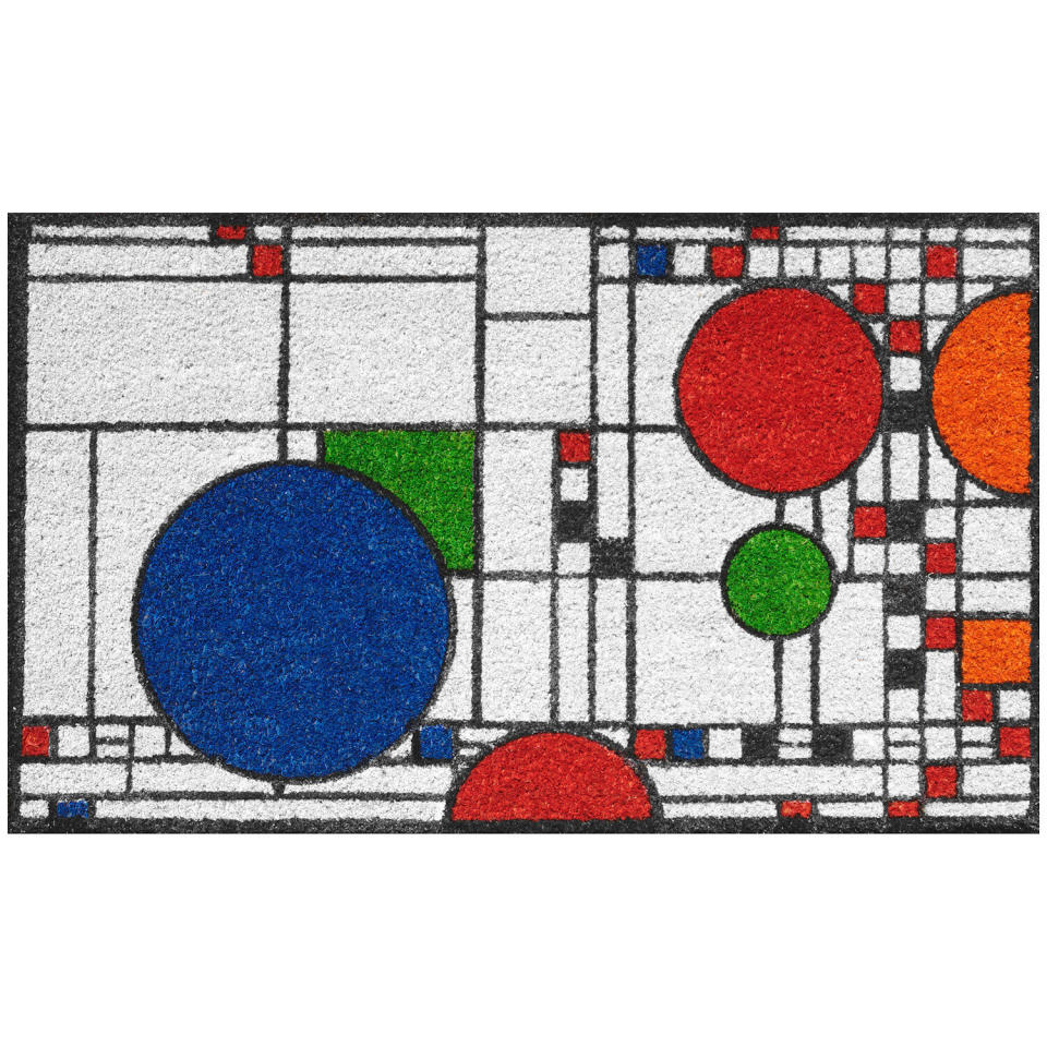 Inspired by famous architect Frank Lloyd Wright, this doormat has the geometric pattern featured on windows that Wright designed for a playhouse in Illinois. It's quite a welcoming present, if we do say so ourselves. <a href="https://fave.co/2HYblAv" target="_blank" rel="noopener noreferrer">Find it for $50 at ShopPBS</a>.