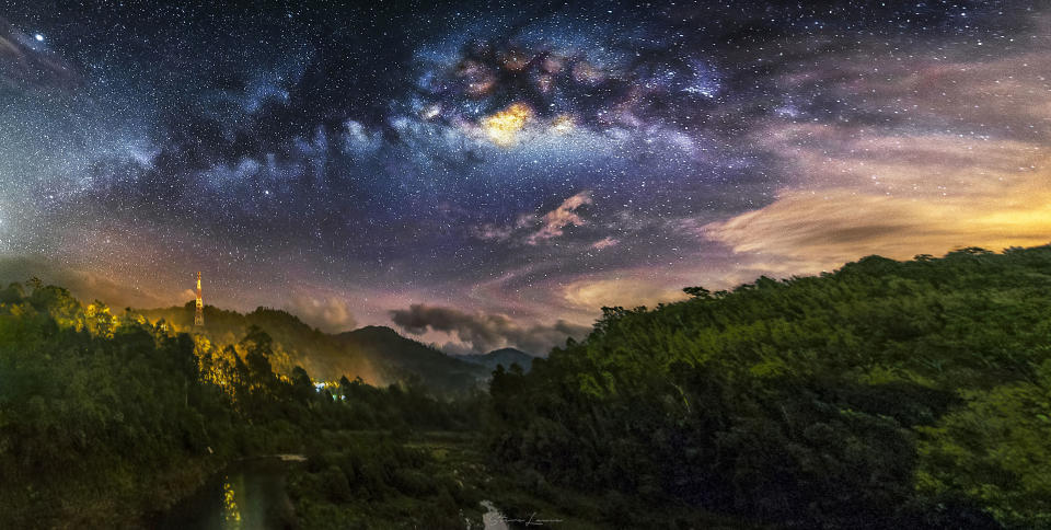 The Milky Way shines down on Mount Fuji