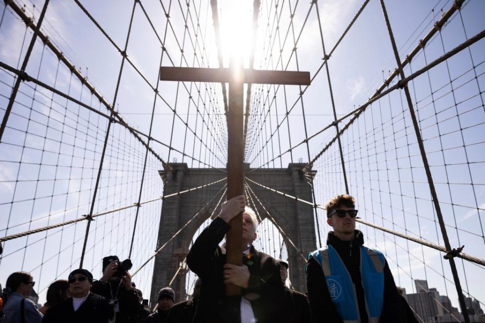 The weather was good for the hundreds of worshipers who set out from St. James Cathedral-Basilica on a two-mile journey around 10:30 a.m. Friday in Downtown Brooklyn. AP
