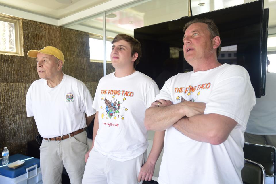 Gary Marinez (left), Ben Marinez (middle) and Greg Marinez inside a pod structure at Fourth Street and Water Street in downtown Port Huron on Friday, May 13, 2022.