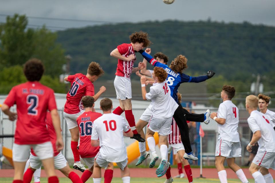 Hornell's Gennaro Picco goes heads and shoulders above everyone to get a head on the corner kick in Hornell's 7-2 victory over Dansville Wednesday night.