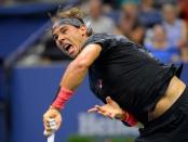 Aug 31, 2015; New York, NY, USA; Rafael Nadal of Spain serves to Borna Coric of Croatia on day one of the 2015 US Open tennis tournament at USTA Billie Jean King National Tennis Center. Mandatory Credit: Robert Deutsch-USA TODAY Sports