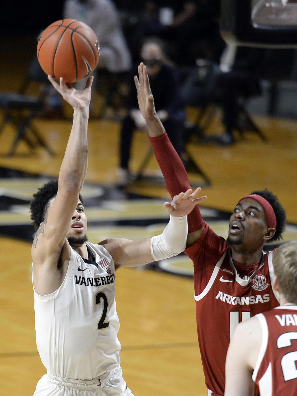 Vanderbilt guard Scotty Pippen Jr. (2) shoots against Arkansas guard Jalen Tate (11) during the first half of an NCAA college basketball game Saturday, Jan. 23, 2021, in Nashville, Tenn. (AP Photo/Mark Zaleski)