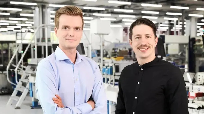 EthonAI co-founders Julian Senoner (CEO, left) and Bernhard Kratzwald (CTO, right) at a Siemens factory in Zug, Switzerland