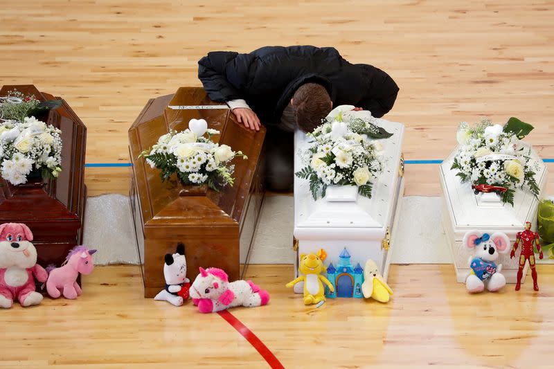 Mourners attend a lying-in-state for victims who died in a migrant shipwreck, in Crotone
