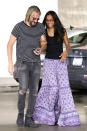 <p>Saldana and her hubby, Marco Perego, showed their love for each other — and for books! — on a library outing in L.A. (Photo: Poersch/BACKGRID) </p>