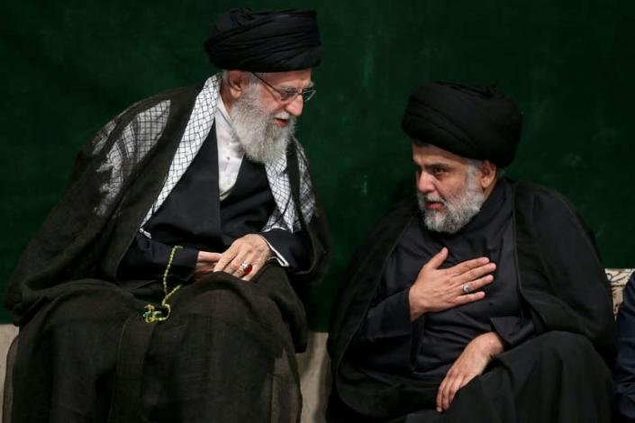 Iran's supreme leader Ayatollah Ali Khamenei (L) speaking with Iraqi Shiite cleric, politician and militia leader Moqtada al-Sadr during a religious ceremony in the capital Tehran (AFP Photo/-)