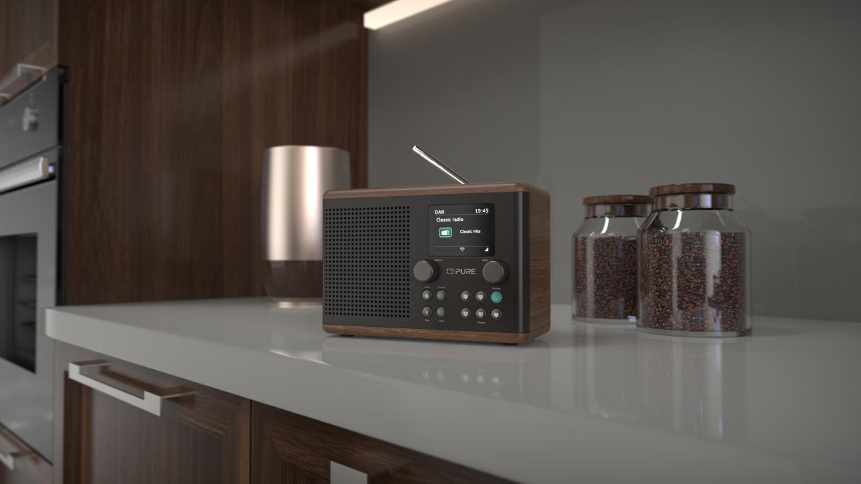  Pure Classic H4 radio in walnut on a kitchen counter . 