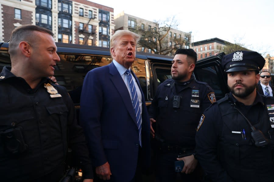 Former president Donald Trump, comments after visiting a bodega, Tuesday, April 16, 2024, who’s owner was attacked last year in New York. Fresh from a Manhattan courtroom, Donald Trump visited a New York bodega where a man was stabbed to death, a stark pivot for the former president as he juggles being a criminal defendant and the Republican challenger intent on blaming President Joe Biden for crime. Alba’s attorney, Rich Cardinale, second from left, and Fransisco Marte, president of the Bodega Association, looked on. (AP Photo/Yuki Iwamura)