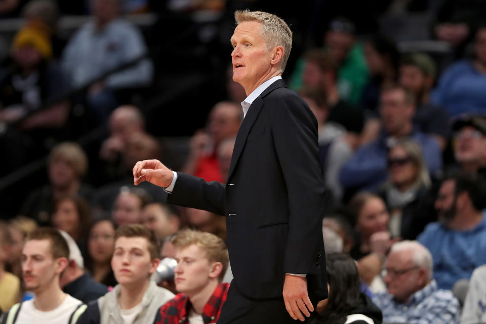 Golden State Warriors coach Steve Kerr works the sidelines in the first quarter of their game against the Denver Nuggets at the Pepsi Center on March 03, 2020, in Denver, Colorado.