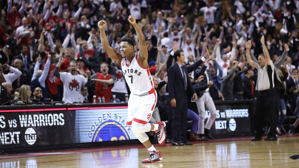 Kyle Lowry celebrates after hitting a miraculous buzzer-beater to force overtime in Game 1 of the 2016 Eastern Conference semifinals against the Miami Heat. (Steve Russell/Toronto Star via Getty Images)