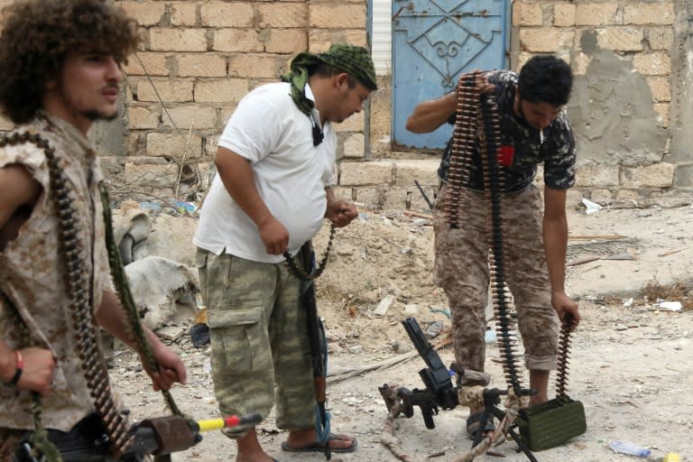 Forces loyal to Libya's UN-backed government prepare their weapons in Sirte on August 28, 2016, for a military operation to clear IS jihadists from the city