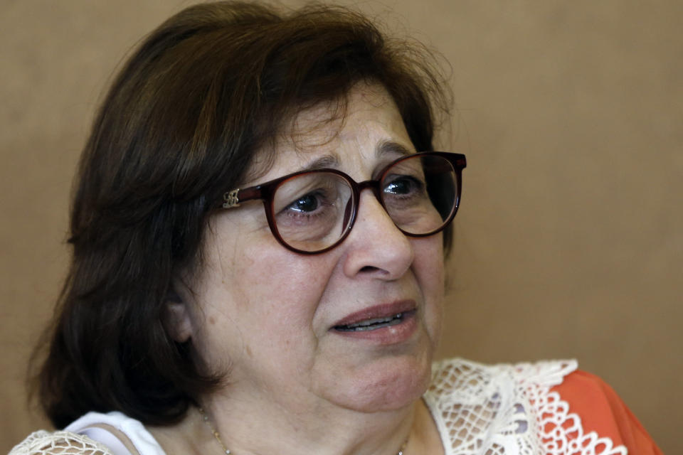 Laure Ghosn, whose husband Charbel Zogheib has been missing for the past 37 years, cries as she speaks during an interview at her home in Sarba, north of Beirut, Lebanon on June 26, 2020. Ghosn said her husband is held in Syria and hopes that a new wave of sanctions imposed by the U.S. against the Syrian government will force Damascus to reveal the fate of hundreds of Lebanese citizens held in Syria, including that of her husband. (AP Photo/Bilal Hussein)