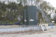 An XTO Energy natural gas fracking well pad is seen in Freeport, Pennsylvania, on Thursday, October 15, 2020. President Trump accuses Joe Biden of wanting to ban fracking, a sensitive topic in the No. 2 natural gas state behind Texas. Biden insists he does not want to ban fracking broadly - he wants to ban it on federal lands and make electricity production fossil-fuel free by 2035. (AP Photo/Ted Shaffrey)