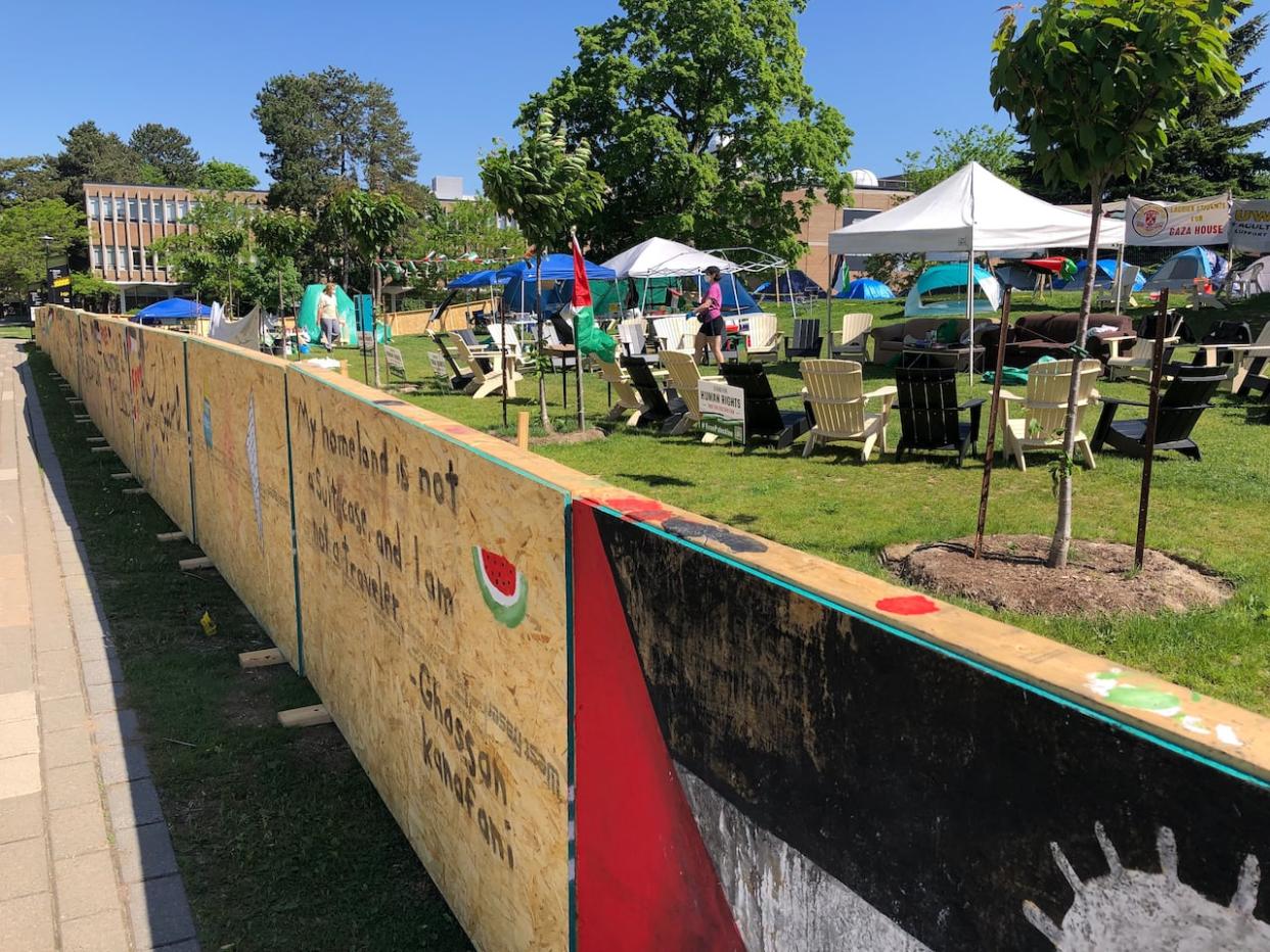 The University of Waterloo has issued a formal notice to protesters to end an encampment set up on May 13. The school says the encampment has violated at least six university policies. (Aastha Shetty/CBC - image credit)