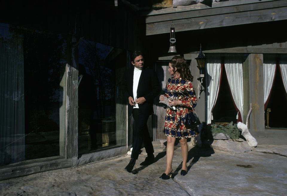 Johnny and June stroll on the patio, 1969. (Photo: Getty Images)