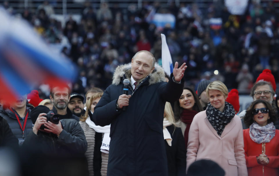 <p>Russian President Vladimir Putin delivers a speech during a rally to support his bid in the upcoming presidential election at Luzhniki Stadium in Moscow, Russia, March 3, 2018. (Photo: Maxim Shemetov/Reuters) </p>