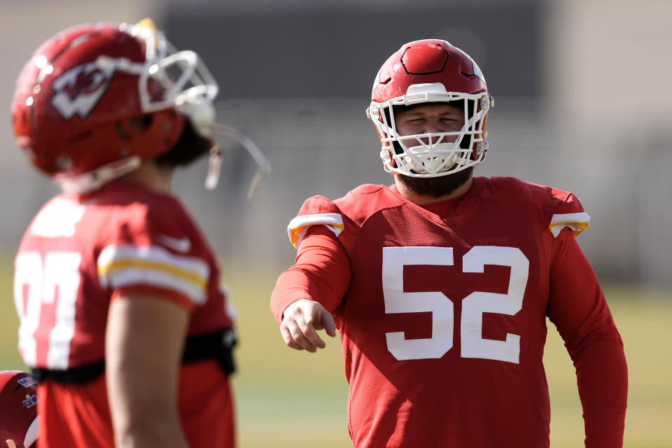 Kansas City Chiefs center Creed Humphrey (52) talks to tight end Travis Kelce (87) during practice for Super Bowl 58 Friday, Feb. 9, 2024 in Henderson, Nev. The Chiefs will play the NFL football game against the San Francisco 49ers Sunday in Las Vegas. (AP Photo/Charlie Riedel)