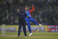 Delhi Capitals' Kuldeep Yadav celebrates the wicket of Rajasthan Royals' Ravichandran Ashwin during the Indian Premier League cricket match between Delhi Capitals and Rajasthan Royals in New Delhi, India, Tuesday, May 7, 2024. (AP Photo/Manish Swarup)