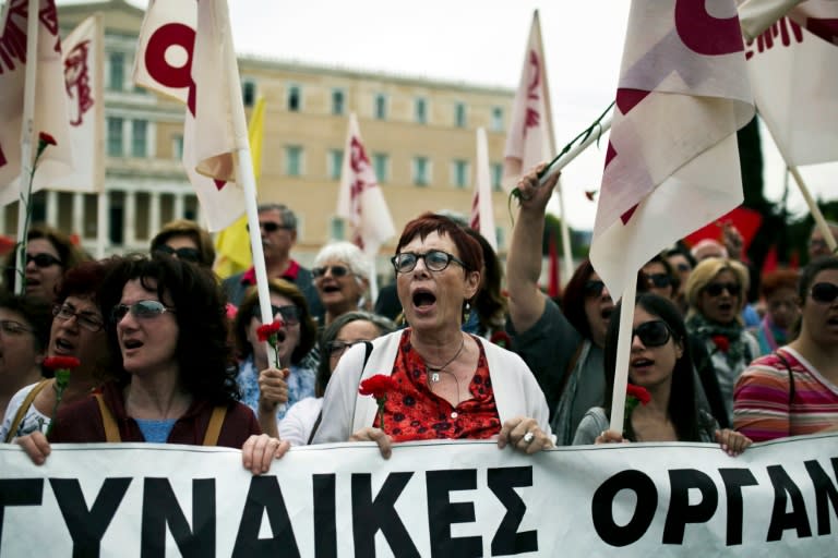 Members of the communist-affiliated PAME union take part in a rally in Athens on May 8, 2016