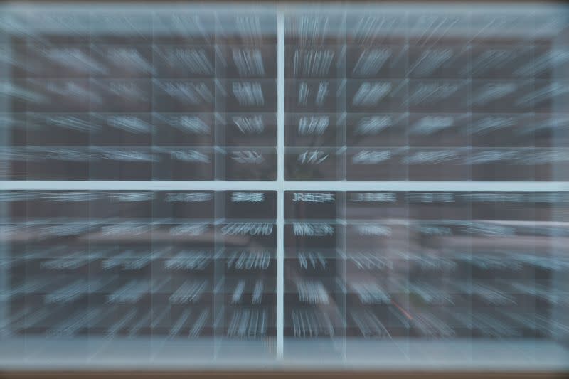 A blank stock quotation board is pictured after the Tokyo Stock Exchange (TSE) temporarily suspended all trading due to system problems in Tokyo