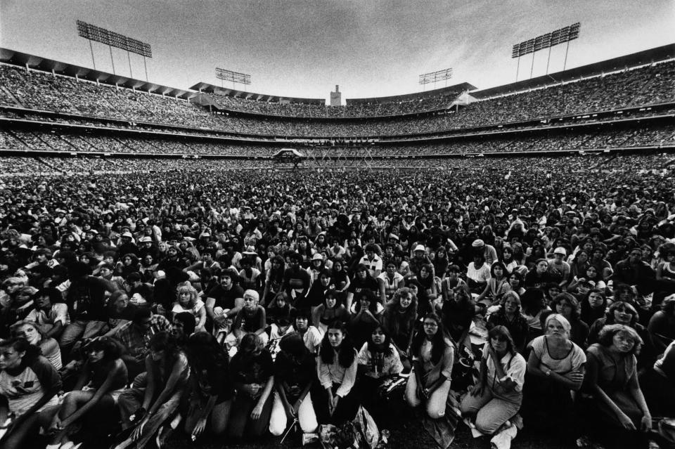 Eighty-thousand humans wait for big brother Bee Gees to get squeaking at LA’s Dodger Stadium in 1979. (Credit: George Rose via Getty Images)