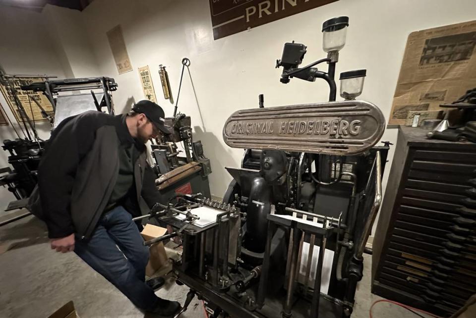 Owyhee County Museum director Eriks Garsvo fires up a 1950 Heidelberg Press, which is in working condition, thanks to Historical Society board president Bob Schaffer, who spent his career in newspaper printing. He plans to pass on his knowledge of printing presses to Garsvo.