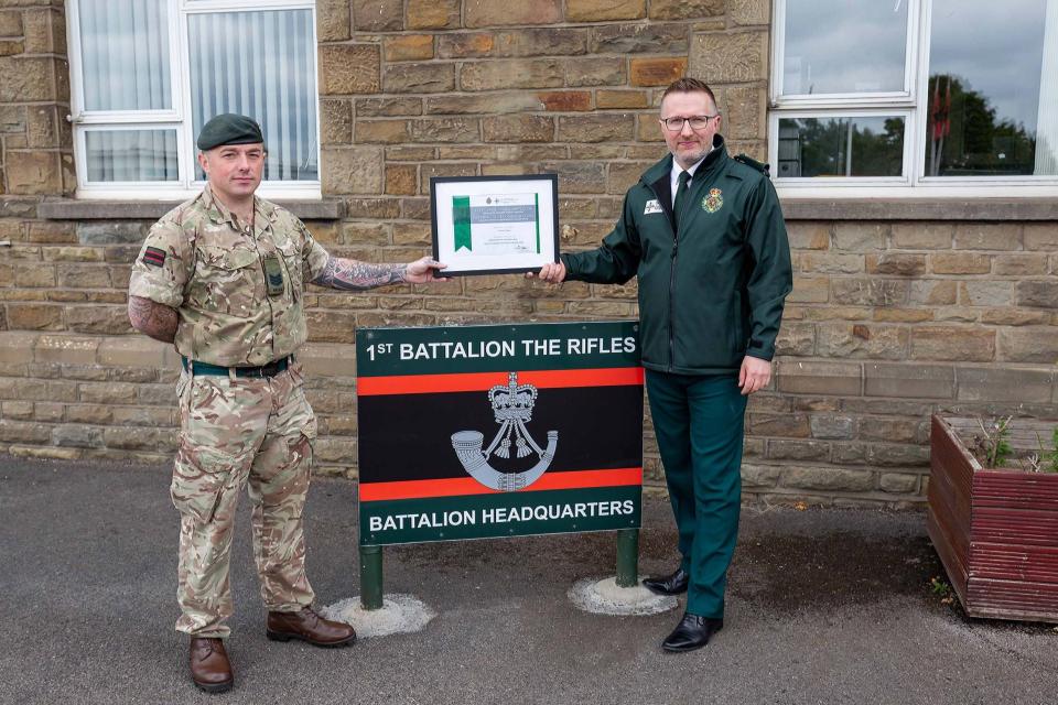 Serjeant Wayne Delahunty (left) with Jason Killens (PA)