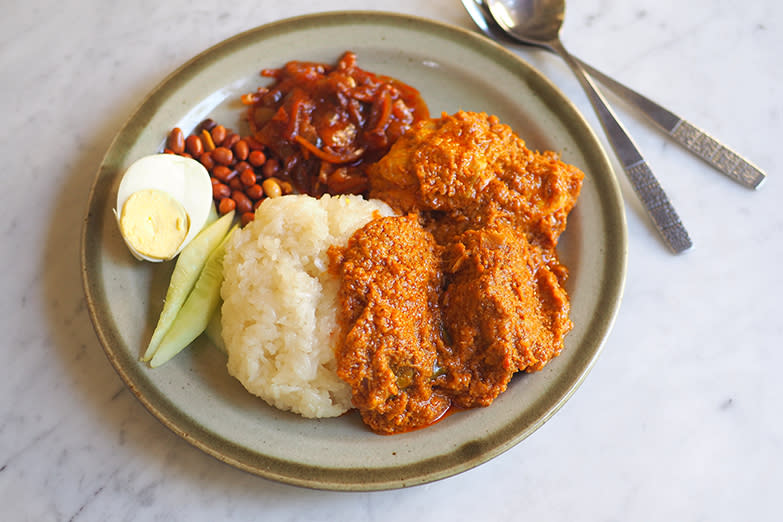 Get a satisfying plate of 'pulut' paired with creamy 'ayam rendang' at Restoran Say Yes Cafe, this new eatery at Damansara Utama. — Pictures by Lee Khang Yi