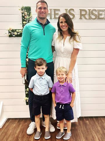 <p>Julie Cousins Instagram</p> Kirk Cousins and Julie Hampton posing with their sons, Cooper and Turner