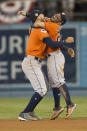 <p>Jose Altuve #27 and Carlos Correa #1 of the Houston Astros celebrate on the field after the Astros defeated the Los Angeles Dodgers in Game 7 of the 2017 World Series at Dodger Stadium on Wednesday, November 1, 2017 in Los Angeles, California. (Photo by Rob Tringali/MLB Photos via Getty Images) </p>