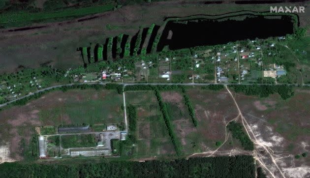 A satellite image shows homes and farms in Korsunka, Ukraine before the flood – May 15, 2023.