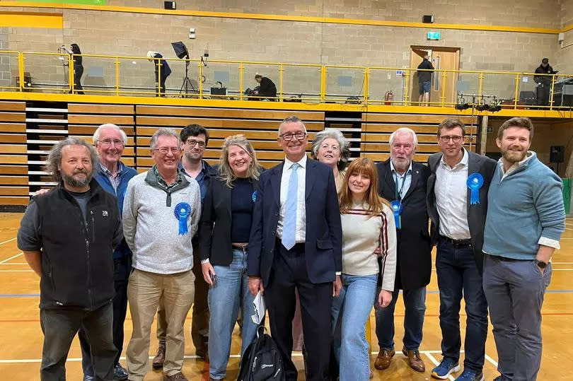 Sir Bernard Jenkins (C) with party supporters after being re-elected to serve Harwich & North Essex